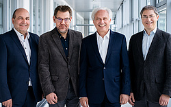 A group picture of Dietmar Jannach, Martin Gebser, Gerhard Friedrich and Wolfgang Faber.